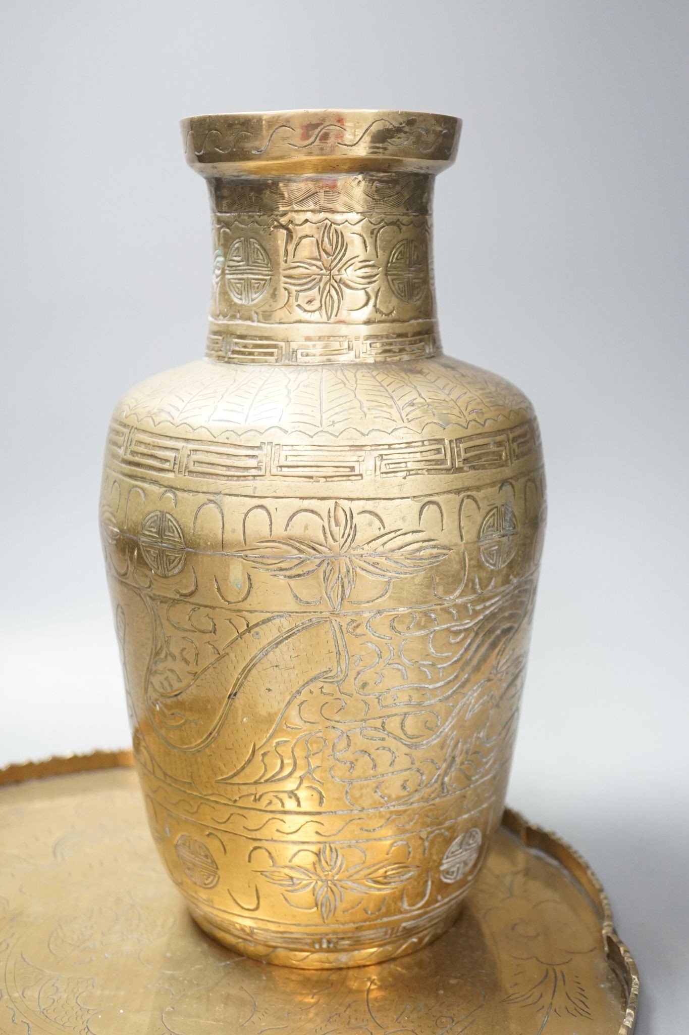 Two early 20th century Chinese bronze vases and tray, 35cm diam.
